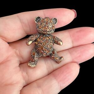 1928 brand teddy bear brooch, copper color with yellow rhinestones